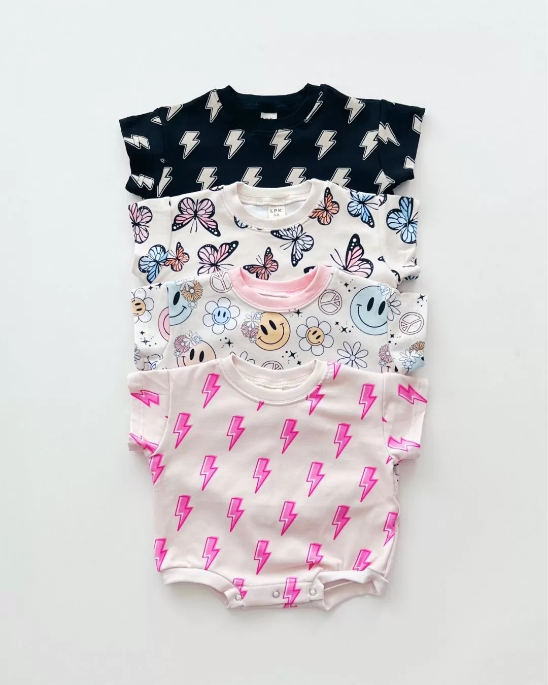 Short Sleeve Bubble Romper | Pink Bolts